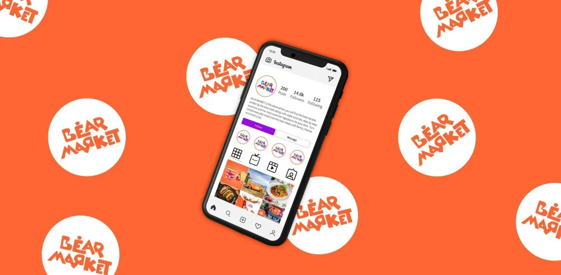 Bear Market app on a phone over an orange pattern