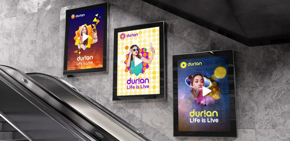 Durian posters along a subway escalator